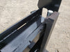 Close-up of Stinger skid steer pallet forks tines and reinforced frame – engineered for strength, balance, and safety.