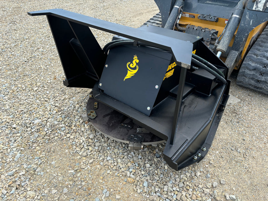 Heavy-duty Stinger skid steer disc mulcher grinding stumps and branches – built for demanding clearing, landscaping, and mulching projects.