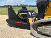 Operator using Stinger skid steer disc mulcher to clear overgrown land – reliable solution for brush control and property maintenance.