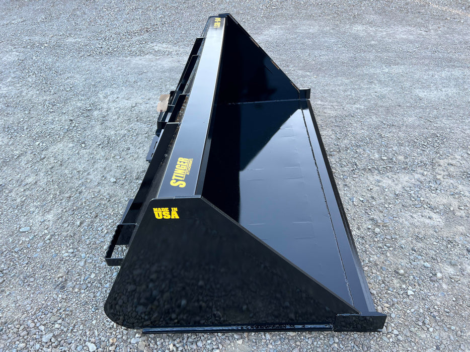 Sturdy skid steer manure bucket carrying compacted manure – reinforced steel construction ensures long-lasting durability.