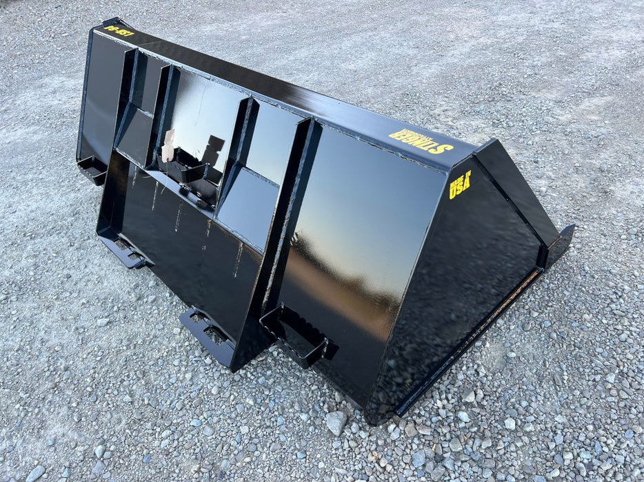 Close-up of heavy-duty skid steer manure bucket cutting edge – designed for efficient scooping and easy material release.
