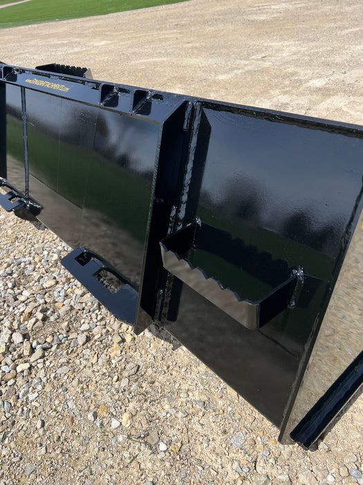 Stinger Series 1 skid steer material bucket lifting rocks and debris – rugged construction ensures maximum efficiency on any jobsite.