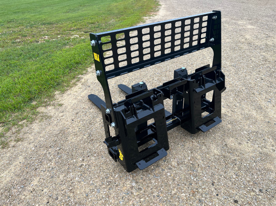 Stinger hydraulic skid steer pallet forks lifting heavy pallet – heavy-duty attachment built for precise and efficient material handling.
