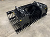 Heavy-duty skid steer rock bucket with skeleton design sifting rocks from soil – durable attachment ideal for land clearing and material separation.