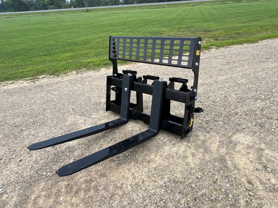 Stinger hydraulic skid steer pallet forks mounted on loader – ideal attachment for warehouses, farms, and industrial worksites.