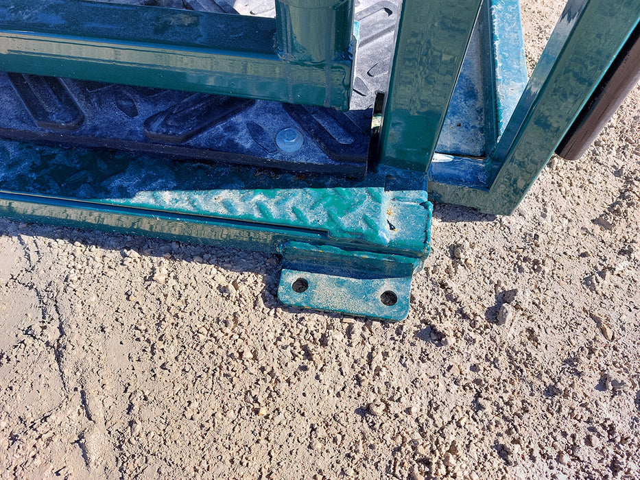 Cattle Squeeze Chute positioned in working pen for secure livestock management