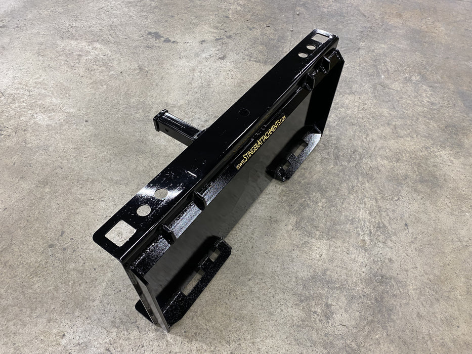 Stinger 2-inch skid steer receiver hitch in action – compact, heavy-duty design built for efficient towing and material handling.