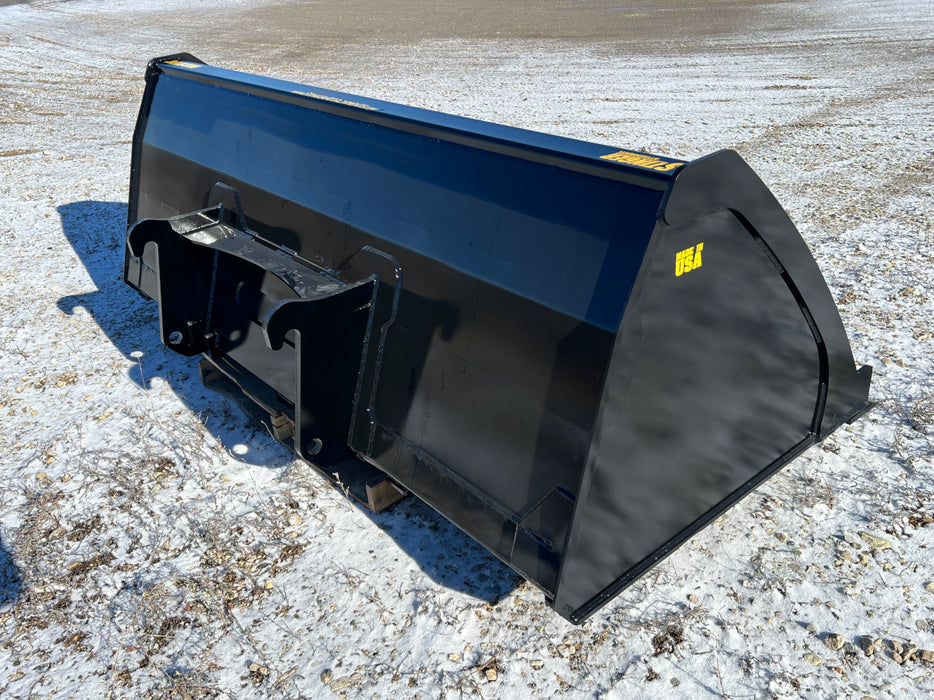 Skid steer bucket filled with silage on dairy farm – heavy-duty tool for efficient feed and material handling operations.