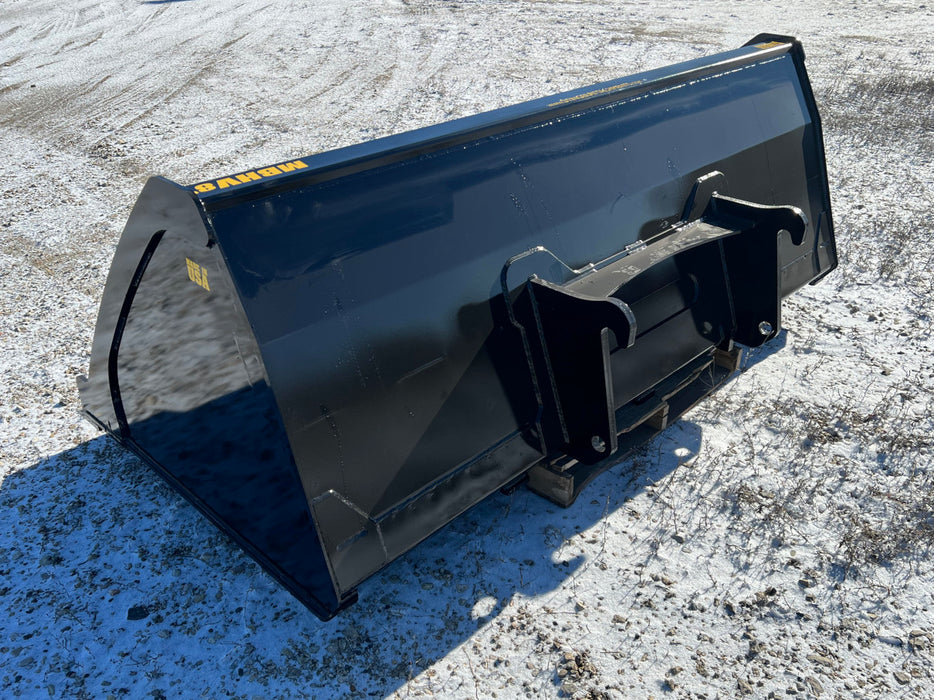 Front view of high capacity skid steer bucket in action – large-volume design ensures faster loading and transport of materials.