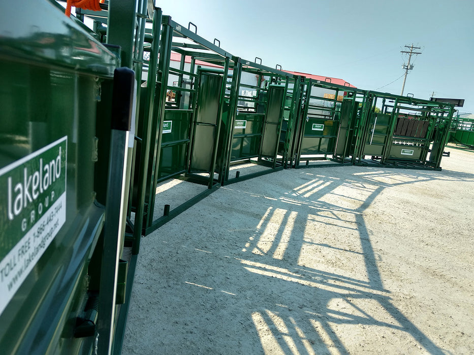 Side view of Lakeland Premium Adjustable Cattle Alley featuring reinforced gates and locking mechanisms