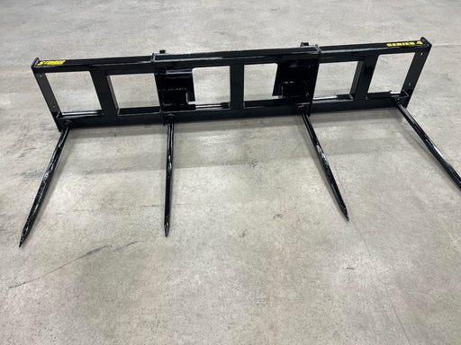 Stinger Series 4 tractor bale spear lifting two large round hay bales – heavy-duty double bale mover built for maximum efficiency and control.