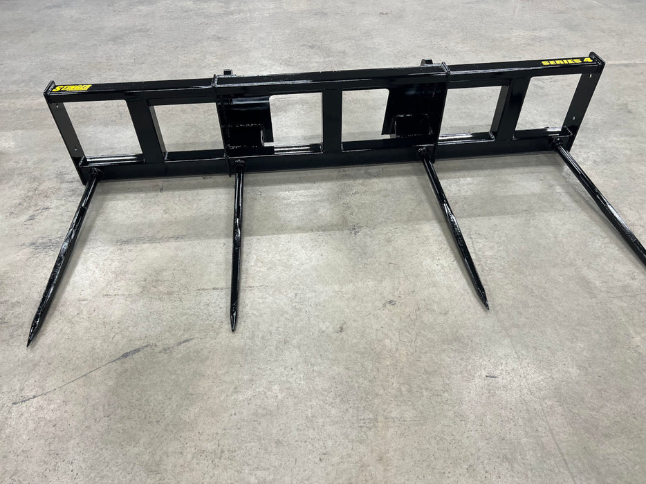 Stinger Series 4 tractor bale spear lifting two large round hay bales – heavy-duty double bale mover built for maximum efficiency and control.