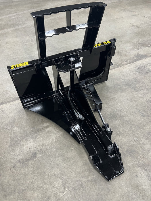 Close-up of skid steer tree puller serrated jaws gripping wood – reinforced steel design ensures long-lasting durability and power.