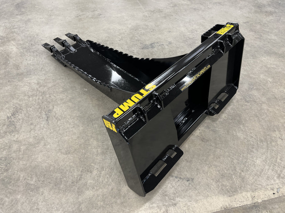 Skid steer stump bucket by Stinger prying through dirt and rocks – reliable attachment built for excavation, trenching, and site prep.