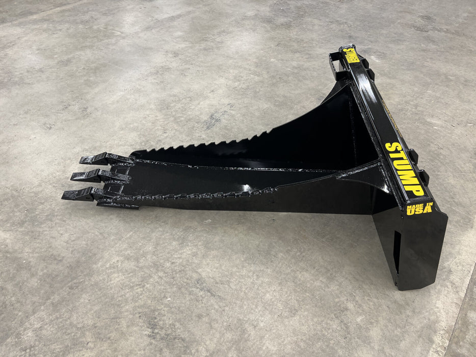 Front view of Stinger skid steer stump bucket digging into hard ground – heavy-duty tool crafted for efficiency and precision.