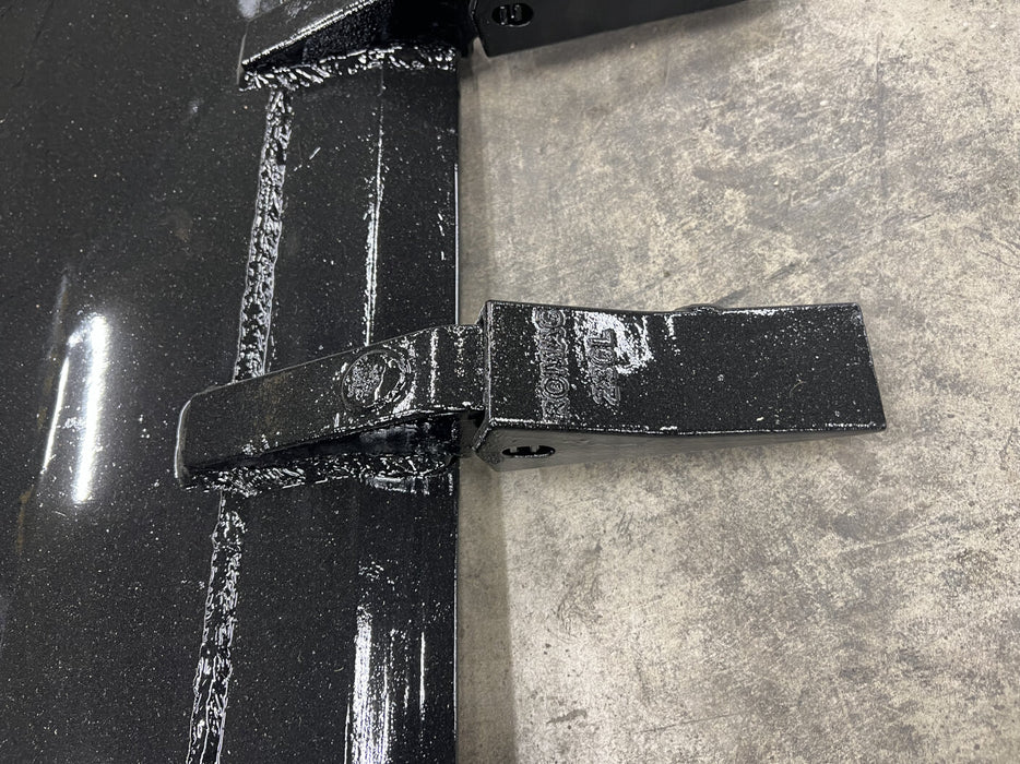 Stinger skid steer tooth bucket attached to loader – professional-grade tool designed for maximum digging power and reliability.