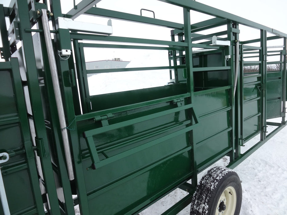 Complete portable cattle handling system with alley, tub, and Cattle Squeeze Chute for safe operation