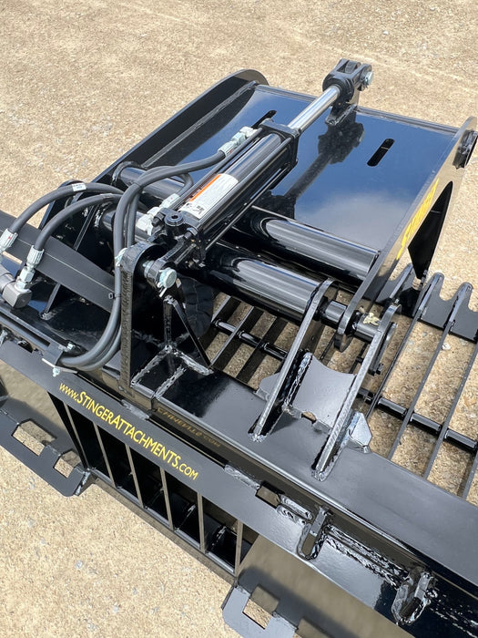 Side view of 48-inch skid steer grapple bucket clamping heavy loads – professional-grade bucket designed for strength and versatility.