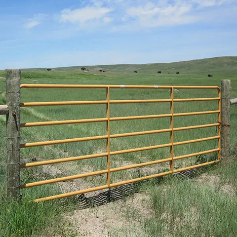 Side view of Sioux Steel Livestock Tall Gate showing durable steel tubing and secure latch for reliable cattle control.