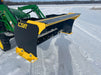 Stinger compact skid steer snow pusher clearing light and packed snow – versatile tool for residential and commercial use.