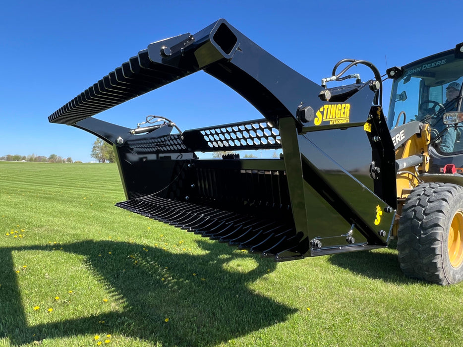 Close-up of the heavy-duty tractor rock bucket teeth and frame engineered for extreme strength and reliability.
