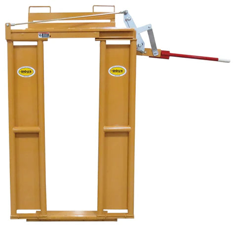 Farmer operating Sioux Steel Manual Cattle Head Gate designed for safe, precise, and low-stress cattle handling.
