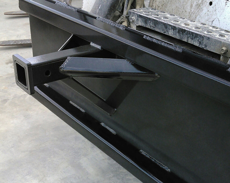 Loflin Fabrication Reese Trailer Hitch Adapter mounted on a skid steer – heavy-duty adapter designed for quick and secure trailer moving and towing tasks.