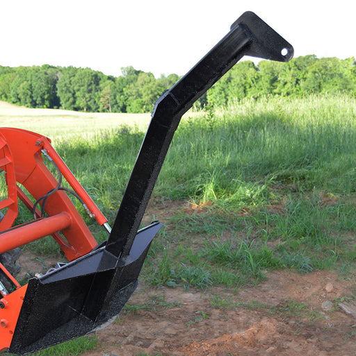 Loflin Fabrication skid steer tree boom lifting and transporting heavy logs – durable attachment designed for landscaping, forestry, and tree removal work.